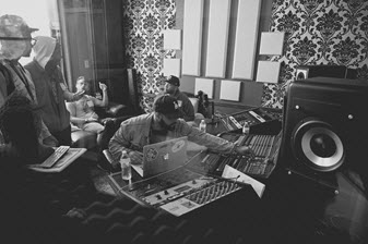 Kendrick Lamar and TDE artists recording in a music studio in Orlando, Florida. 